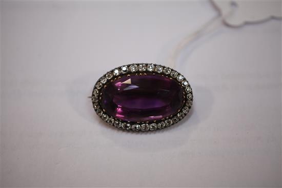 An Edwardian gold and silver, amethyst and diamond oval brooch, 1.25in.